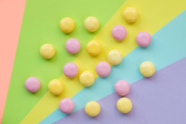 Candy on the color background