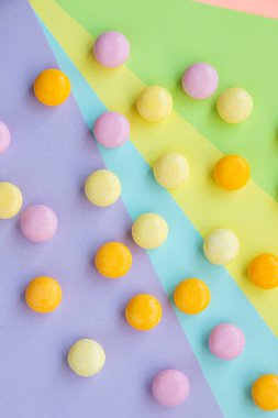 Candy on the color background