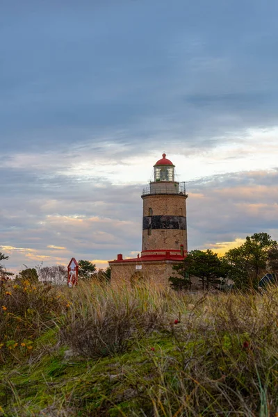 A brick lighthouse with a bright blue sky in the background. Picture of Falsterbo Lighthouse from 1796 in Scania, southern Sweden — Stock Photo, Image