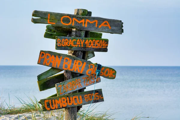 A distance sign at Lomma Beach, Scania, Sweden — Stock Photo, Image