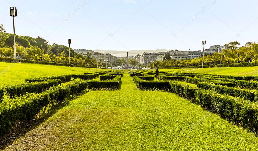 Ornamental hedges in the King Edward VII park lead you through Lisbon, Portugal to the Tagus river