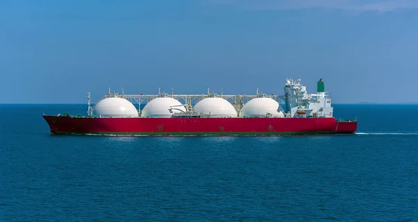 A Liquid Natural Gas tanker ship in the Singapore Straits in Asia in sumertime