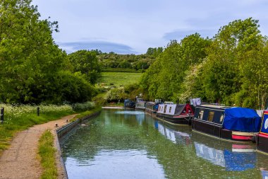 A view across the canal basin on the Oxford Canal at the village of Napton, Warwickshire in summertime clipart