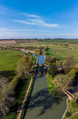 An aerial view of the of locks and canal basin on Oxford Canal at Hillmorton, Warwickshire, UK on a bright Spring day clipart