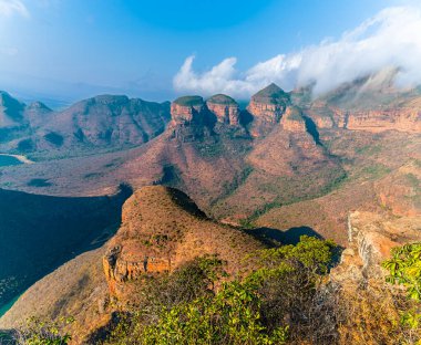 A view from the rim of Blyde River Canyon overlooking the dam towards the three Rondavels,  Mpumalanga, South Africa in Springtime