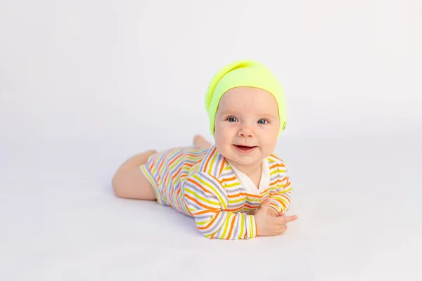 Small Smiling Baby Girl Months Old Lies White Isolated Background — Stock Photo, Image