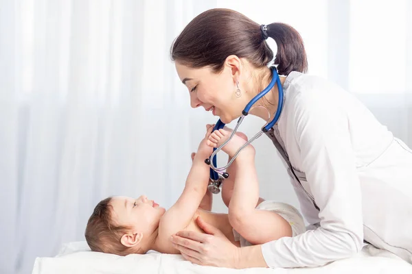 Pediatrics Doctor Examines Baby Boy Uses Stethoscope Listen Baby Heartbeat Royalty Free Stock Photos