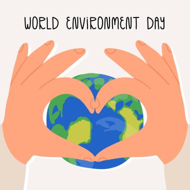 Arka planda aşk işareti, kalp ve Dünya gezegeni var. Dünya Çevre Günü harfleri.