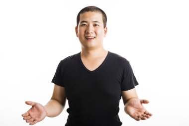 Genç Asyalı adam ayakta beyaz izole