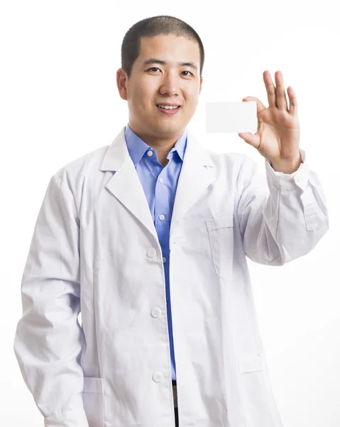 Young doctor standing isolated on white — Stock Photo, Image