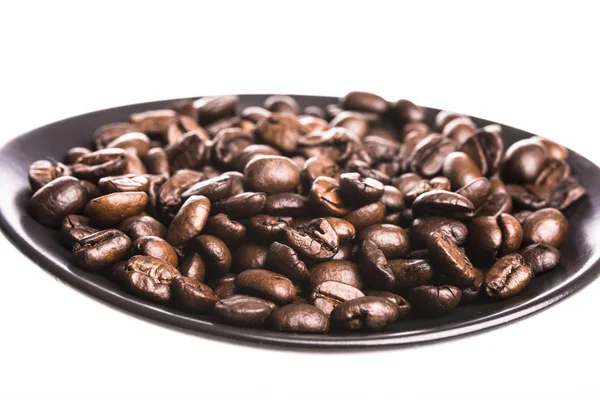 Coffee beans in the dish — Stock Photo, Image