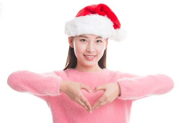 Jeune femme asiatique avec chapeau de Noël isolé sur blanc . — Photo