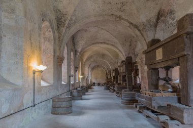 EBERBACH, GERMANY-MAY 29, 2019: historical wine presses in the lay refectory of the Eberbach monastery, Hessen, Germany clipart