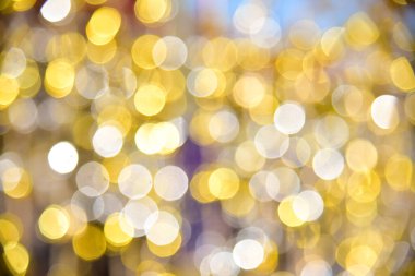 Bulanık bokeh hafif altın arkaplan.