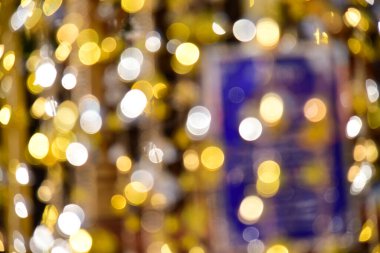 Bulanık bokeh hafif altın arkaplan.