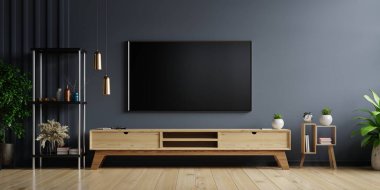 Oturma odasındaki karanlık duvarda LED TV, ahşap dolap, minimal tasarım, 3D görüntüleme