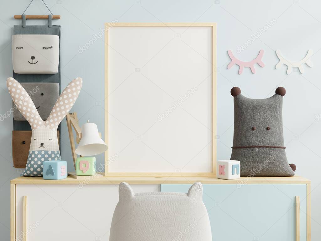 Mock up poster frame in children room and there is a blue wall behind,3d rendering