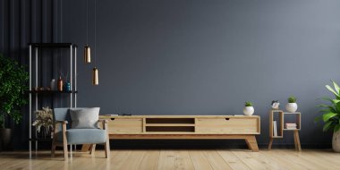 Modern oturma odasındaki kabine televizyonu boş siyah duvarlı koltuklu parlak bir oturma odasının iç mekanı.