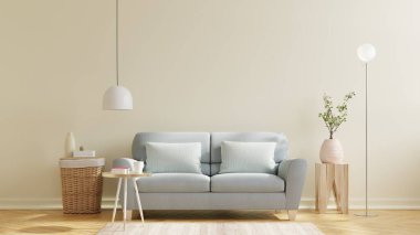 Oturma odasının iç duvarı, kanepede sıcak tonda dekorlu 33D işlemeli.