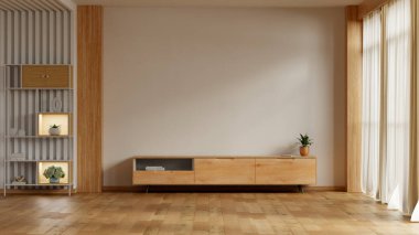 Boş bej duvarlı, ahşap bir televizyon dolabı, raflar ve ahşap parke döşemeli, dekorasyon veya ürün yerleştirmeye hazır modern bir oturma odası tasarımı.