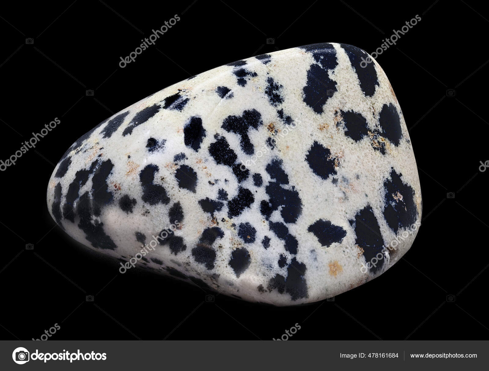 White gemstone with black spots deals