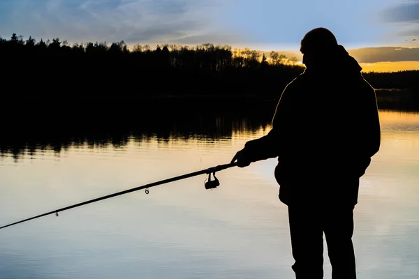 Pescador al atardecer —  Fotos de Stock