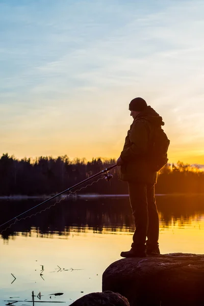 Pescador al atardecer —  Fotos de Stock