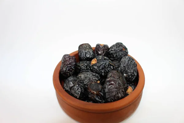 Ajwa dates. Dried dates. Prophet dates on white background. Iftar time — Stock Photo, Image