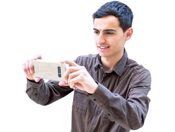 Арабський Хлопець Який Самовіддано Користується Своїм Розумним Телефоном — стокове фото