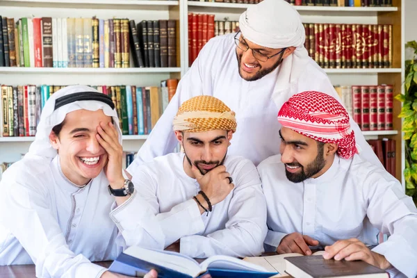 Group of arabic guys studying for exam together