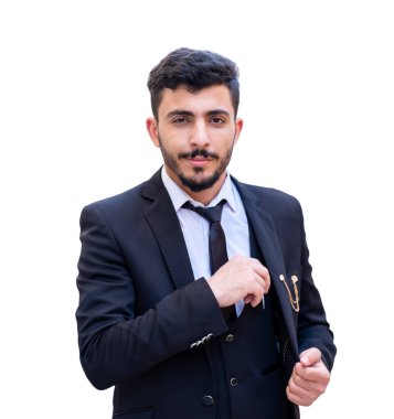 Kendine güveni yüksek bir Arap işadamı müşteriye bakarken ona kartvizitini veriyor.