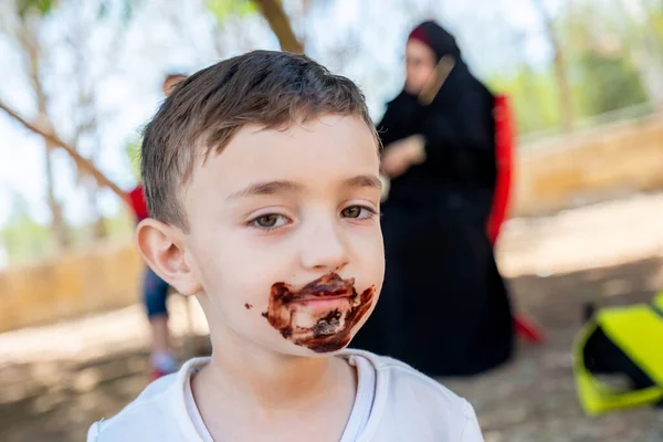 Happy Little Boy Enjoying Getting His Hands Covered Chocolate — Stock Photo, Image