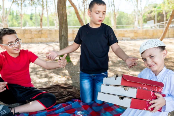 Happy Arabic Boys Enjoying Pizza Together Park — Stock Photo, Image