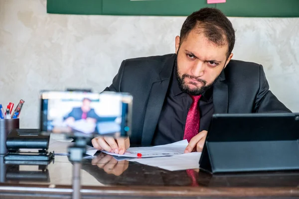 Happy male coach teacher webinar speaker looking at camera giving online class lecture or making conference video chat call, smiling businessman entrepreneur recording video training, webcam view