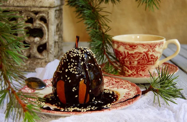 Christmas dessert pear with chocolate — Stock Photo, Image