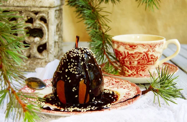 Christmas dessert pear with chocolate — Stock Photo, Image
