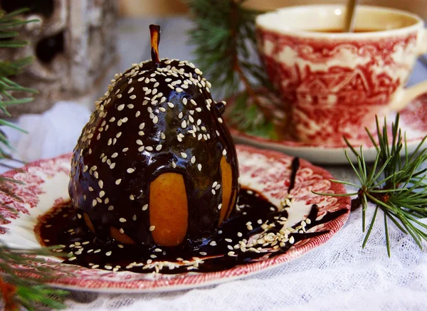 Christmas dessert pear with chocolate — Stock Photo, Image