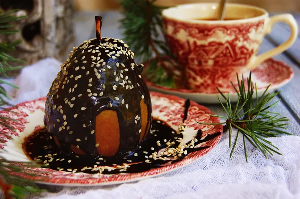 Christmas dessert pear with chocolate — Stock Photo, Image