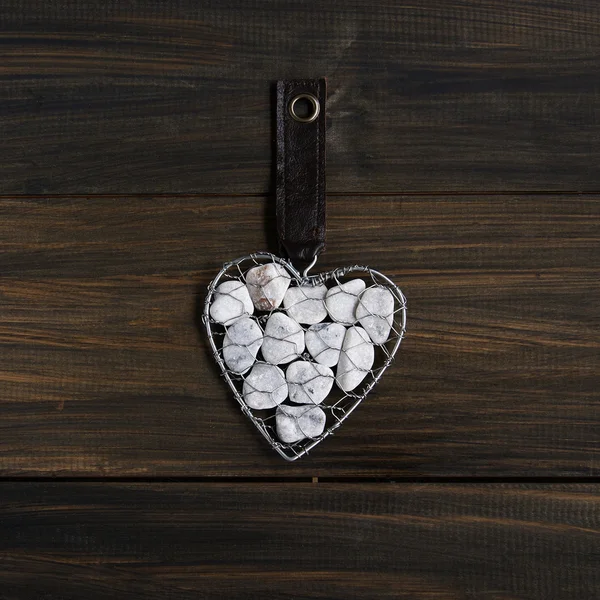 Rock Heart on wooden background — Stock Photo, Image