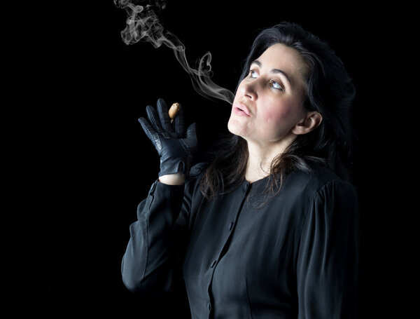 Woman in Black Blowing Cigar Smoke