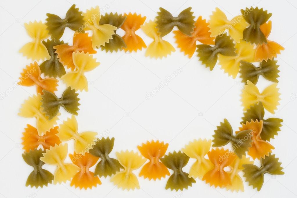 Tri Color Bow Tie Pasta Border on White Background