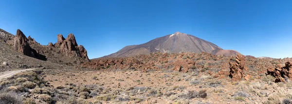 Volcanic desert landscape with Teide volcano in the Teide National Park in Tenerife, Canary Islands, Spain