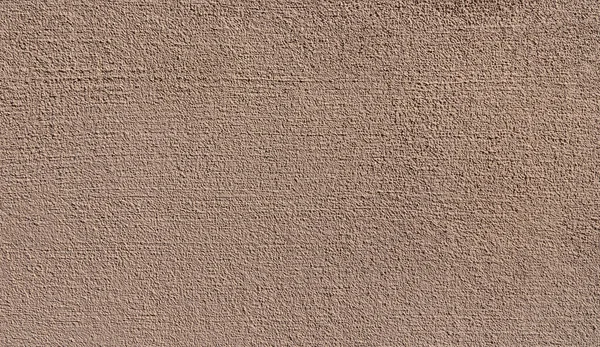 Close New Brown Granular Plaster Sunny Wall — Stock Photo, Image