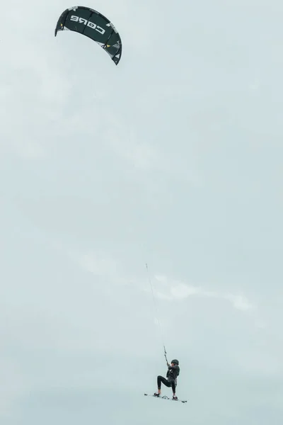 kitesurfer flies across the sky of the North Sea in Germany