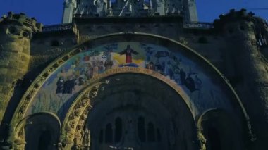 4k stunning aerial view on the Expiatory Church of the Sacred Heart of Jesus in Barcelona.