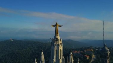 4k stunning aerial view on the Expiatory Church of the Sacred Heart of Jesus in Barcelona.