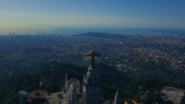 4k stunning aerial view on the Expiatory Church of the Sacred Heart of Jesus in Barcelona.