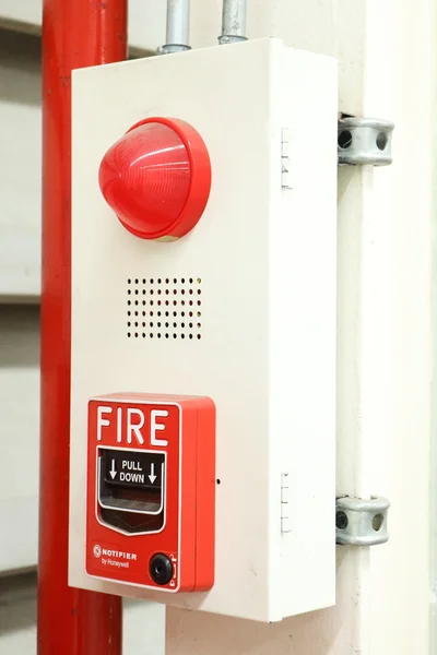 Fire extinguishers and fire alarm — Stock Photo, Image