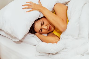 Kadın stresliydi, uykusuzdu, yatağında yeterince dinlenemiyordu.