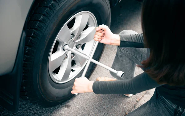 Woman Using Wrench Which Device Changing Tires Pickup Truck Road Stock Picture